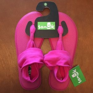 Sanuk sling all pink sandal.